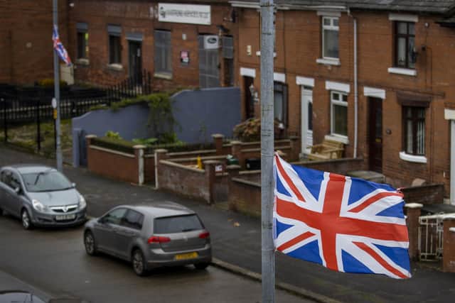 Union flags flies on lampposts in the loyalist area of The Village in south Belfast.  Photo: Liam McBurney/PA Wire