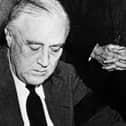 President Roosevelt signs the declaration of war against Japan in December 1941