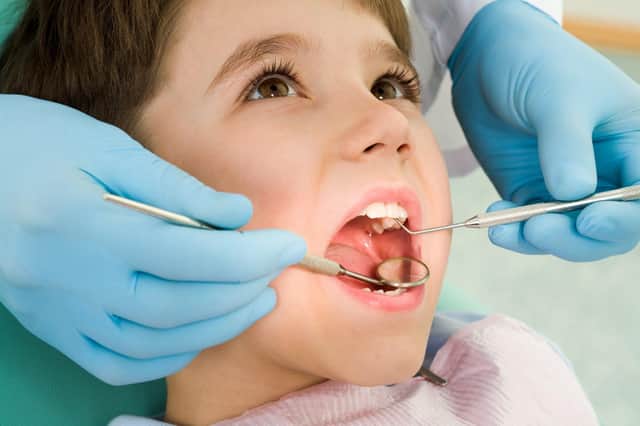 Colm Gildernew said more than 200 children were waiting for emergency dental treatment