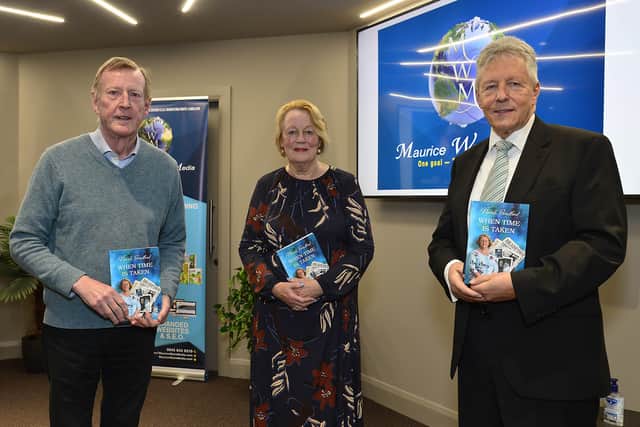 Lord Trimble (left), Norah Bradford and Peter Robinson at the launch of 'When Time is Taken'. 
Picture: Arthur Allison/Pacemaker Press.