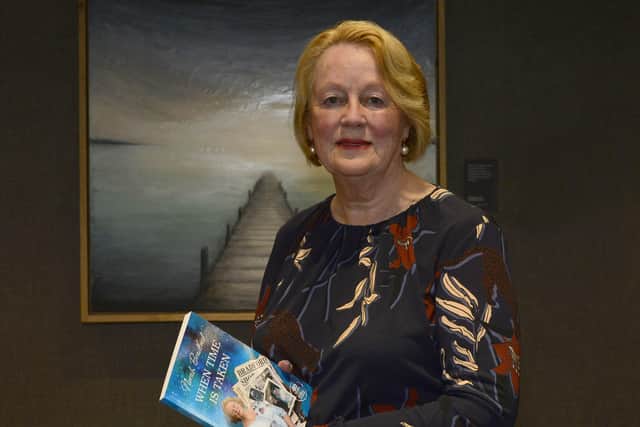 Mrs Norah Bradford, the wife of the late Rev Robert Bradford MP, with her new book 'When Time is Taken'. 
Picture: Arthur Allison/Pacemaker Press.
