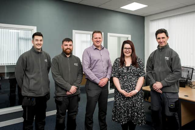 Martin Smart, gas engineer, Jim Friel, operations director, Vlad Markelovs, fabric technician, Chris Shirlaw, electrical engineer and Elaine O’Brien, facilities co-ordinator mark the launch of Parr Facilities Management’s new Glasgow-based team