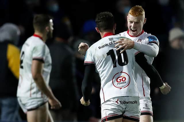 DUBLIN, IRELAND - NOVEMBER 27: Nathan Doak of Ulster celebrates with team mate Billy Burns after the match between Leinster v Ulster at RDS Arena on November 27, 2021 in Dublin, Ireland. (Photo by Oisin Keniry/Getty Images)