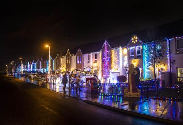 Residents of Racecourse Drive in Derry recreate their annual 'Christmas Drive' to raise funds for local charities by transforming the street into a winter wonderland.