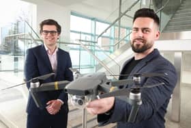 Pictured at Deloitte’s offices in Belfast are Jason Starbuck from Deloitte and Sean McAllister (with drone), the chief executive of innovative Ballymena-based cemetery software and mapping business PlotBox, which entered the Fast 50 ranking for the first time this year