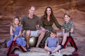 Handout image provided by Kensington Palace of the photograph which features on Their Royal Highnesses' Christmas card this year which shows The Duke and Duchess with their three children Prince George (right), Princess Charlotte and Prince Louis in Jordan earlier this year. Issue date: Friday December 10, 2021.