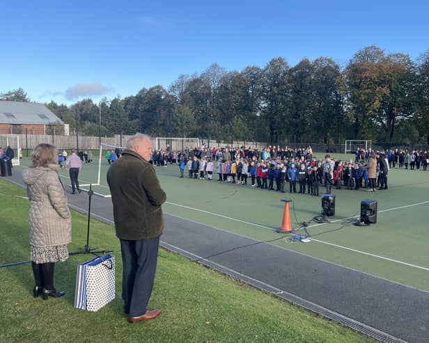 Terry Shields addresses King's Park Primary School at an outdoor assembly to mark his retirement