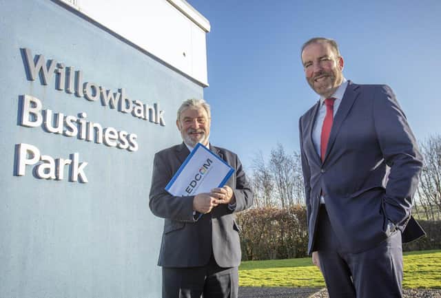LEDCOM’s Chairman, Dr Norman Apsley, OBE is pictured outside Willowbank Business Park in Larne, alongside LEDCOM’s chief executive, Ken Nelson
