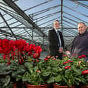 Ulster Bank business development manager Paul Reid pictured with Wilderness Flower & Garden Centre owner Kyle Archer