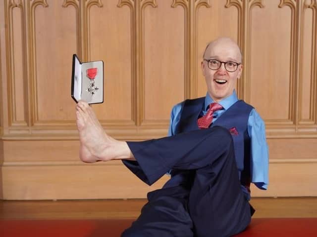 Brian was proud to receive his MBE