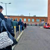 Massive queues for Covid booster shots at the RVH in Belfast; queue time roughly two hours!
