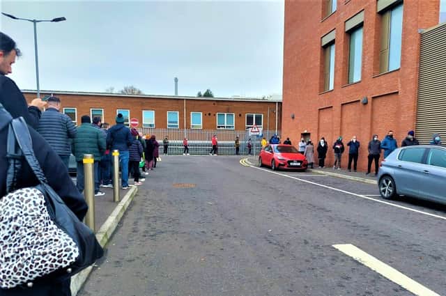 Massive queues for Covid booster shots at the RVH in Belfast; queue time roughly two hours!