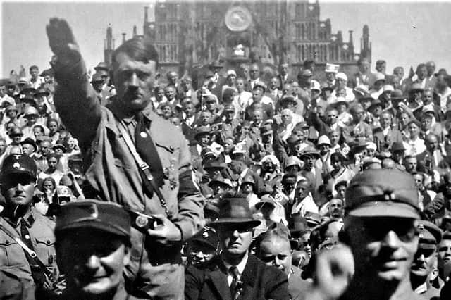 Adolf Hitler at a rally in 1928