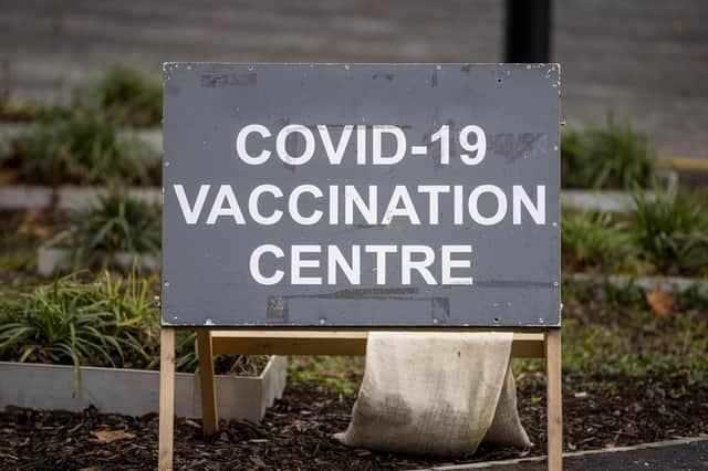 Sign for the COVID-19 vaccination centre at Dundonald Hospital in Belfast, Northern Ireland. Liam McBurney/PA Wire.