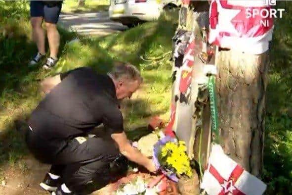 Former NI football manager Michael O'Neill at the Joey Dunlop memorial in Estonia. BBC image