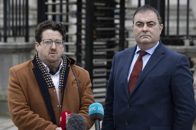 Sean Napier (left) and his solicitor Paul Farrell outside at the Royal Courts of Justice in Belfast give reaction to a High Court Judge ruling that DUP Ministers who are boycotting cross-border political meetings as part of a protest against Brexit's NI Protocol are in 'abject breach of their solemn pledge'.