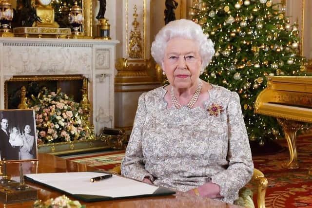 Queen Elizabeth II in the White Drawing Room at Buckingham Palace after recording her Christmas speech in 2018