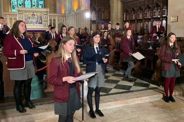 A joint choir from Armagh Royal school and St Paul’s school, Bessbrook sing out in St Patrick’s cathedral, Armagh