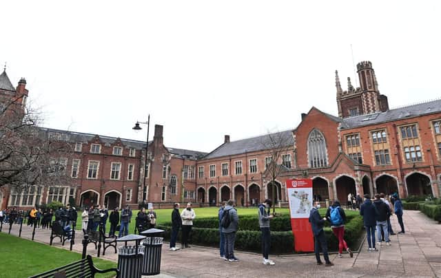 Queues at Queen's University in Belfast on Monday for  vaccinations and boosters after the booster programme was opened up to everybody over the age of 18