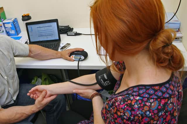 A blood pressure check with a GP.