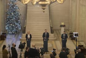 Michelle O’Neill, Paul Givan and Robin Swann at Stormont yesterday "add insult to injury" with their new measures on business