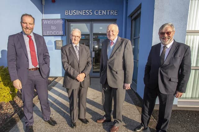 Arthur Henderson MBE and Roy Beggs MBE with Dr Norman Aspley OBE, chair and  Ken Nelson MBE, chief executive, Ledcom.