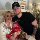 Kaitlin McElkerney (mum) and Reece McGinley (dad) and baby Nainsi weighing 7lb 14ozs born at 0440, from West Belfast.Pic Colm Lenaghan/ Pacemaker