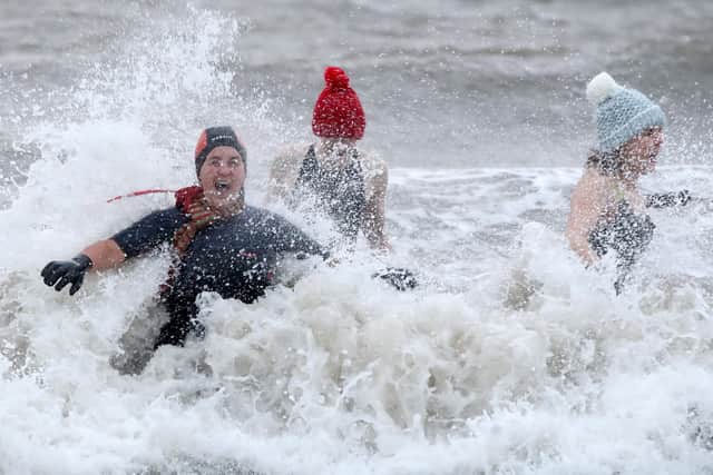 Splashing around in the bitter cold of Belfast Lough on Christmas Day.

Photograph by Declan Roughan / Press Eye