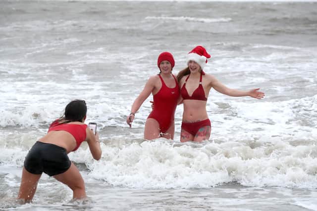 We're in the water on Christamas Day!

(L-R) Fiona Boyd, Kyla Philips and Helen Armstrong at Helen's Bay.

Photograph by Declan Roughan / Press Eye
