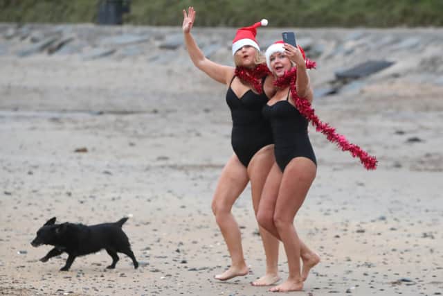 (L-R) Debbie Irwin and Ruth Donnell just before they took their Christmas Day plunge at Helen's Bay.

Photograph by Declan Roughan / Press Eye