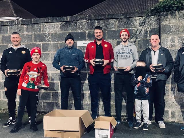 Portadown manager Matthew Tipton (left) with supporters during the club's meal delivery project to the elderly and The Simon Community. Pic courtesy of Portadown FC.