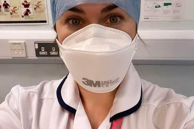 Ciara O'Neill of her in full PPE at work in a Belfast hospital. The Portadown healthcare worker has told how she has combined being on the frontline during the Covid pandemic with her with her second career as a successful singer-songwriter