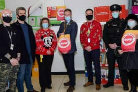 Andrew Millar from Start 360, PCSP chair councillor Danny Donnelly, Catherine McCallion, community champion Asda, Mayor William McCaughey, William Brown, Asda store manager, an officer from Larne Neighbourhood Policing Team and PCSP vice chair Mary Watson