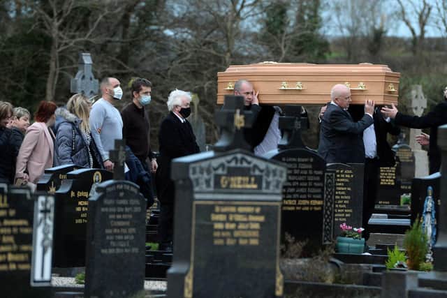 The coffin of Peter (Petey) McNamee being carried in the graveyard the Church of the Immaculate Conception in Beragh he will be laid to rest in the adjoining cemeter