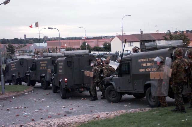 Soldiers and their armoured vehicles on the Garvaghy Road in Drumcree on July 6 1997 after the announcement of the RUC chief constable's decision to allow the Orange Parade to go ahead. An Irish government official asked an NIO minister about speculation that the British Army was "measuring" the Garvaghy Road in Portadown for bollards at the height of the marching dispute