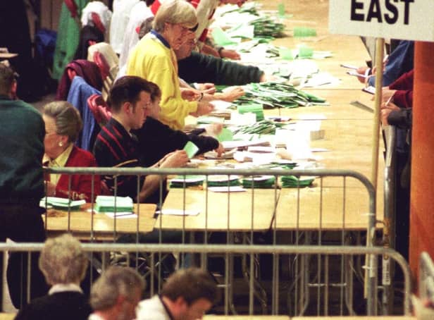 The referendum was held on both sides of the Irish border. Above, votes being counted  Saturday May 23 1998 at Dublin's Royal Horticultral Halls (AP photo/ John Cogill)