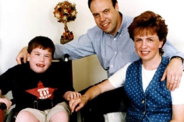 Andrew Dodds, who died in 1998, pictured with his parents Nigel and Diane Dodds