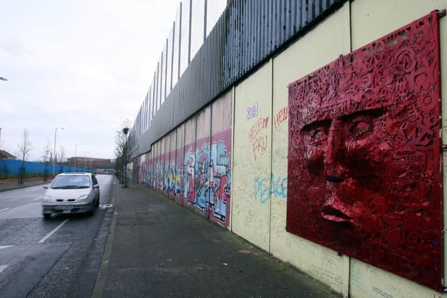 A section of Belfast’s Shankill/Falls peace wall, the longest in Northern Ireland, at Cupar Way