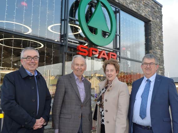 Ruth and Charlie Hamilton with Mr John Agnew, chairman of Henderson Group and Martin Agnew, joint managing director of Henderson Group, which owns the SPAR brand in Northern Ireland, at the opening of Hamilton’s SPAR, Castlederg after its recent renovation. The store is now the biggest SPAR store in the UK offering bays of fresh, locally sourced groceries for the town