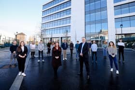 Talent and acquisition consultant at Allstate NI Shannon Ellis and vice president and managing director of Allstate NI John Healy pictured with recent recruits to graduate roles within the company