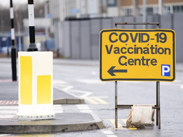 A direction sign outside a COVID Vaccination Centre
