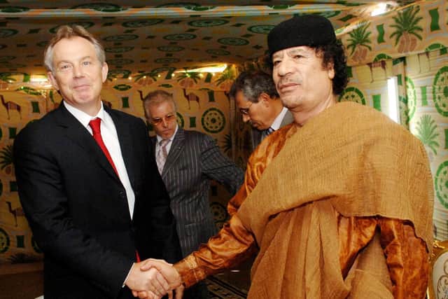Former Prime Minister Tony Blair meeting Libyan leader Colonel Muammar Gaddafi at his desert base outside Sirte south of Tripoli in 2007. Photo: Stefan Rousseau/PA Wire
