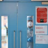 Infection Control nurse Colin Clarke looks out from a Covid-19 recovery ward at Craigavon Area Hospital in Co Armagh, Northern Ireland.