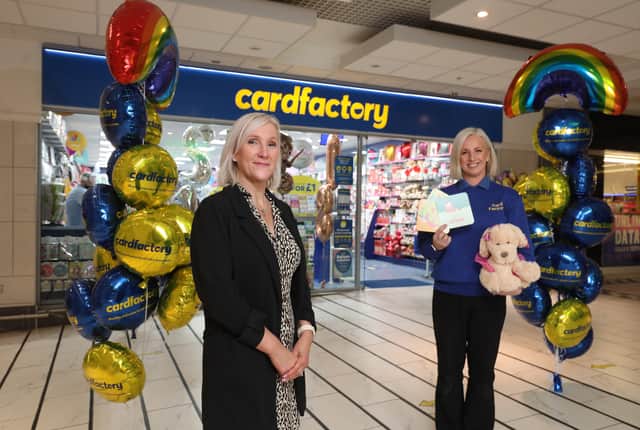 Pictured outside the new store is area manager, Val Irvine and store manager, Mel Sloan