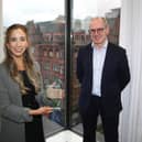 Maria is pictured receiving her award from Danske Bank’s deputy CEO and chief financial officer, Stephen Matchett