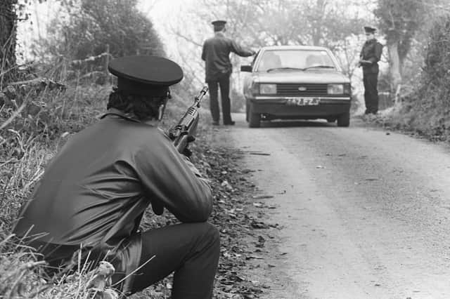 RUC patrol in the border area in 1983. A man from Mars would get the impression that the RUC were the main cause of the Troubles, when they were in fact the single biggest reason that we did not have civil war