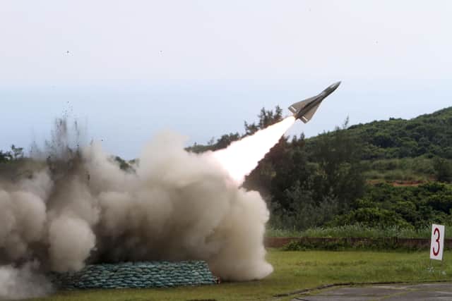 A surface-to-air missile is tested at Jeoupeng military base in Taiwan. China has escalated its threats to 'take back' Taiwan. If war breaks out global oil prices would soar. Taiwan is a major source of electronic supplies so there would be severe implications for car prices (AP Photo/Chiang Ying-ying)