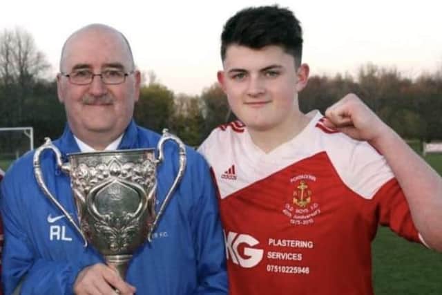 Sixteen-year-old Lee Bonis with Portadown BBOB manager Robert Love after scoring in the club's Foster Cup final victory. Pic courtesy of Portadown BBOB.