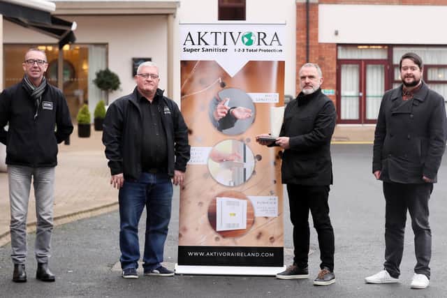 Mark Forsythe and Tommy Kincaid of Aktivora present Glentoran’s Mick McDermott with the Aktivora Manager of the Month trophy for December. They are joined by NIFWA press officer Keith Bailie.