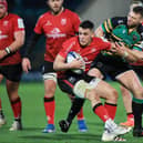 Ulster’s James Hume battles for possession with Dan Bigger of Northampton Saints during the Heineken Champions Cup match. (Photo by David Rogers/Getty Images)